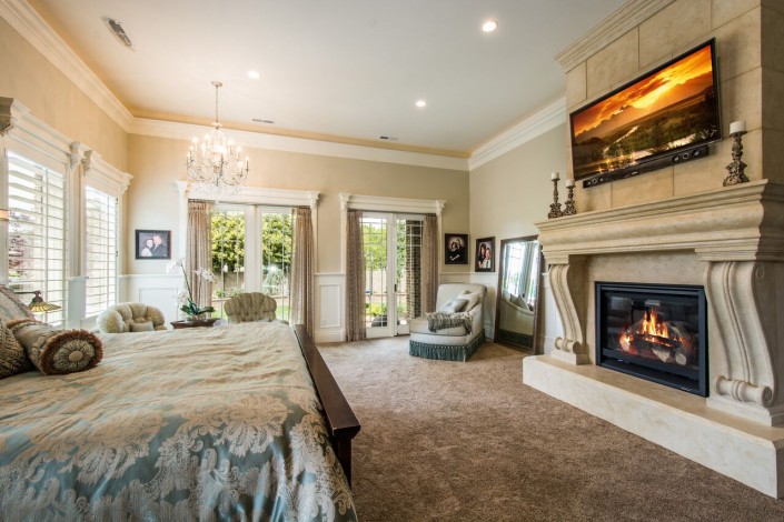 Mont Royal - South Jordan Custom Home Interior bedroom with fireplace