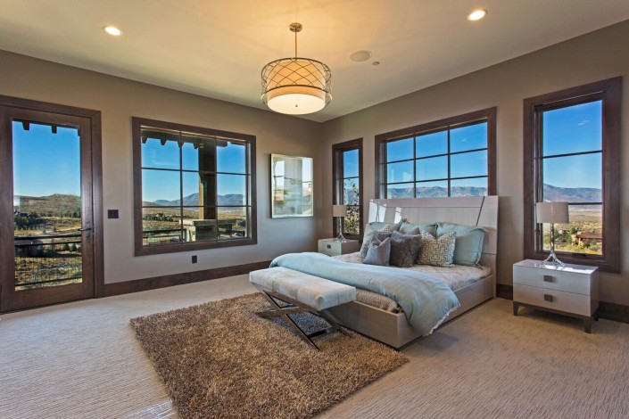 Promontory Rambler - Park City Custom Home Interior Master bedroom with beautiful view